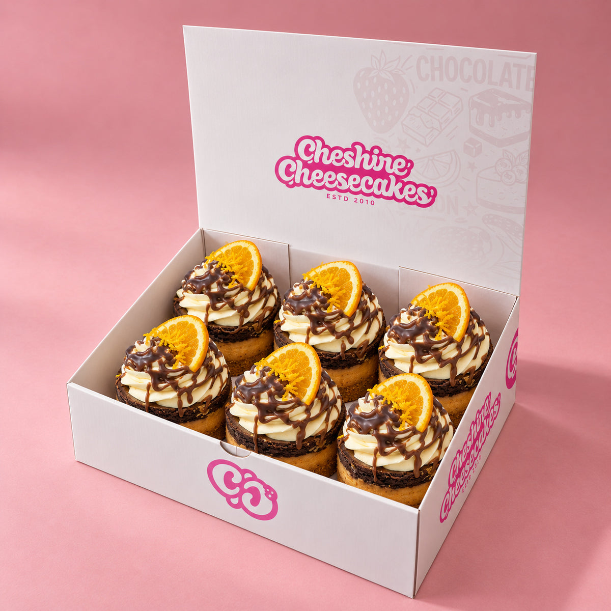 Chocolate Orange Baked Cheesecake Box — box of 6 in blush studio, approved photographic hero