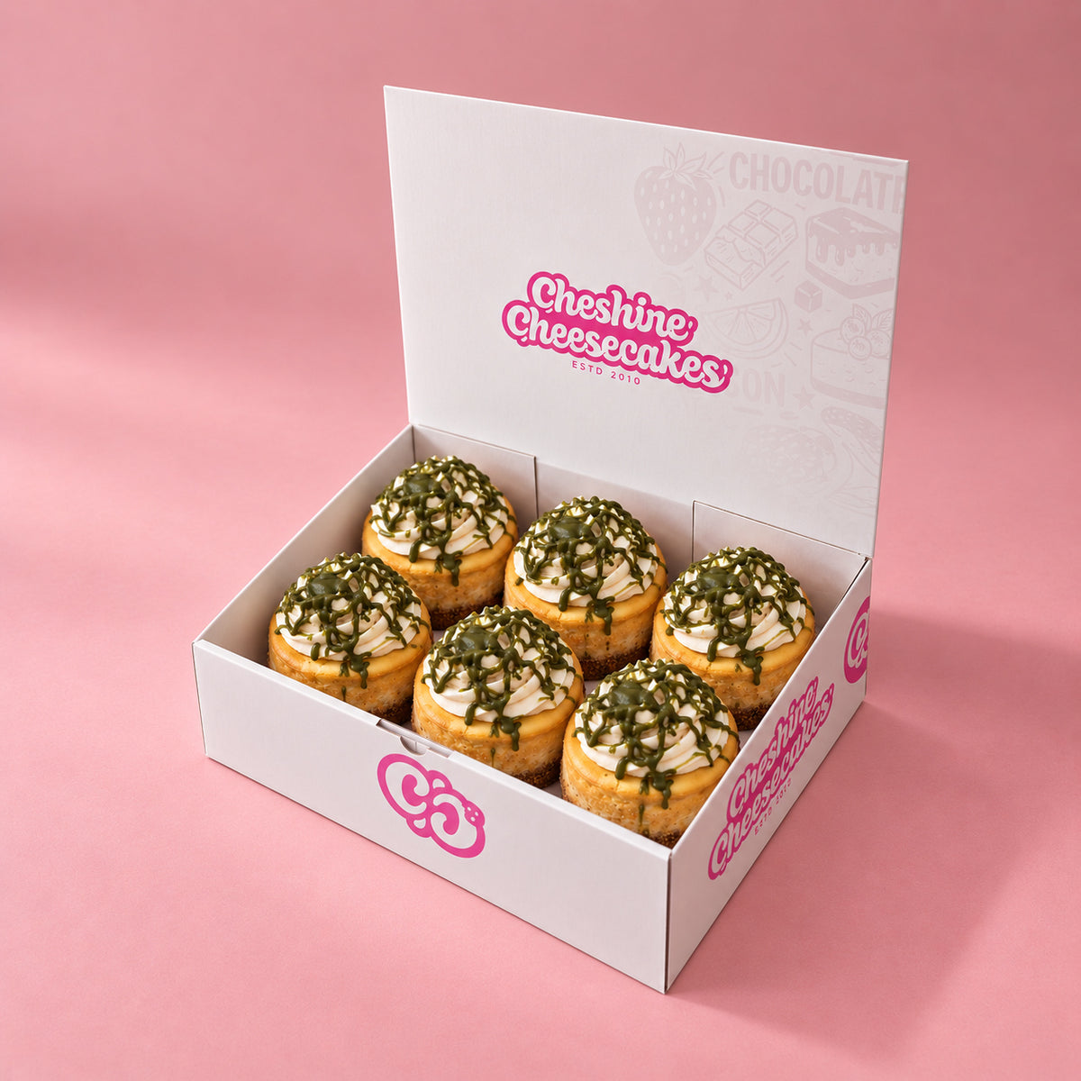 Pistachio Baked Cheesecake Box — box of 6 in blush studio, approved photographic hero